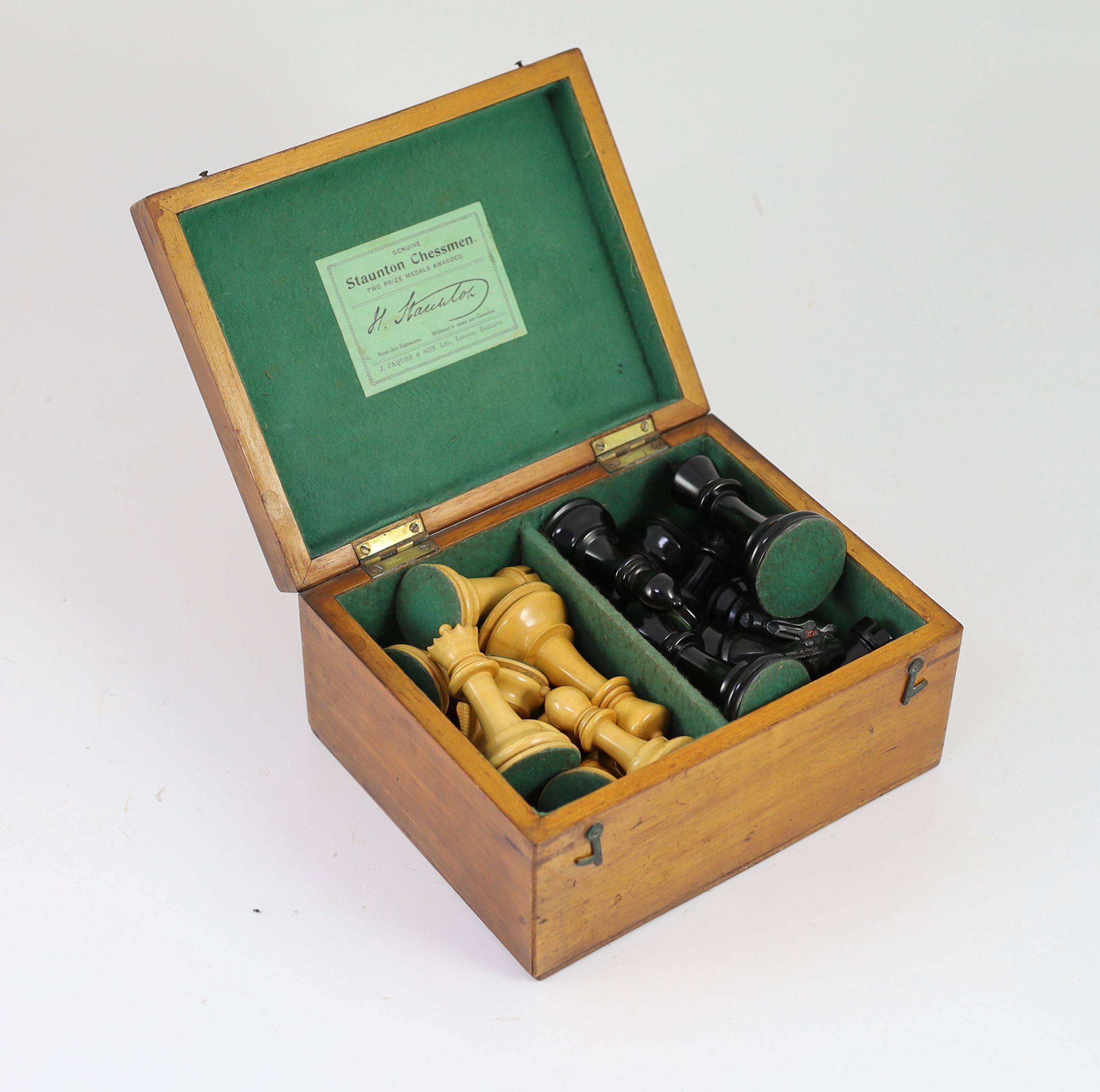 A Jaques & Son Ltd, London 4 in. club size Staunton boxwood and ebony chess set.